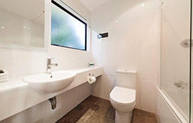 ensuite bathroom with a spa bath